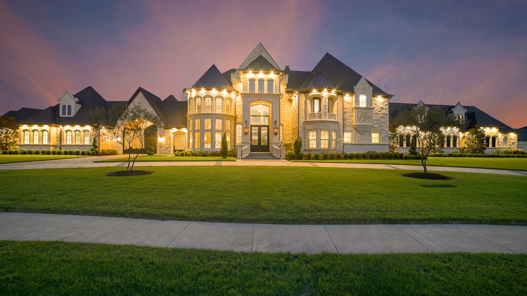 Attractive residential home and green lawn for Fort Mill irrigation service